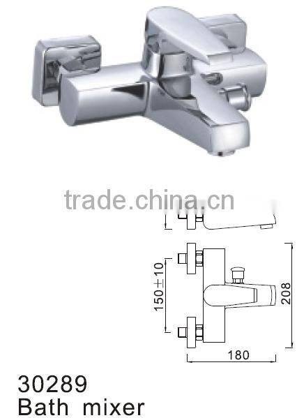 Exposed wall mounted bath and shower mixer tap with divertor