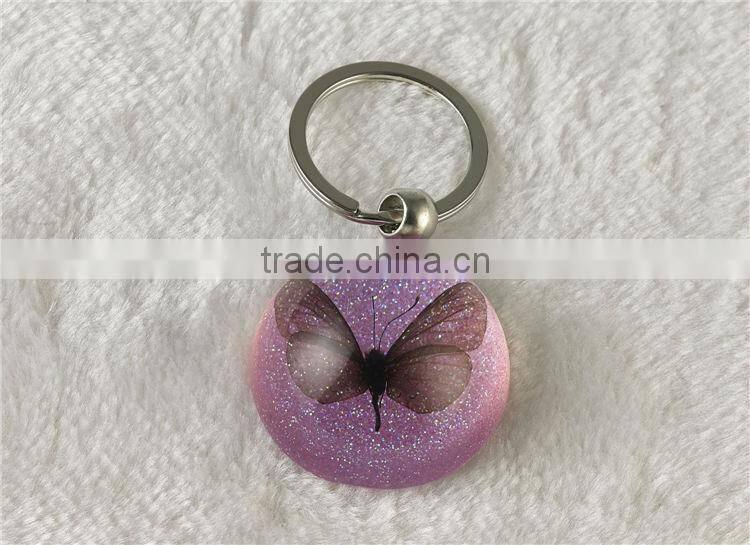 Promotional round shape butterfly and starfish fashion key chain