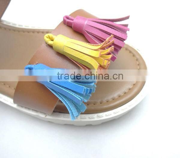 Latest ladies fancy design black pu leathaer flat sandals with ankle tassel strap women summer shoes pictures