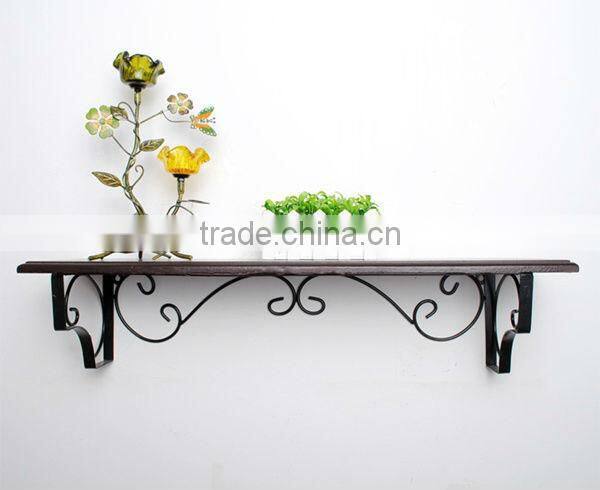 A Pair of Vintage Wrought Iron Architectural Wall Hanging Basket Brackets