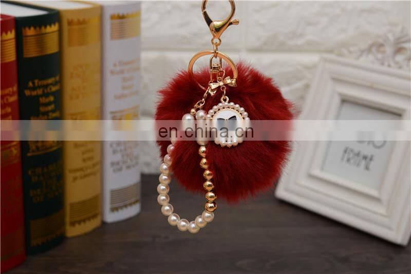 2021 Wholesale custom luxury fur ball key holder Pearl keychains pom pom bow keychain for women bag good quality