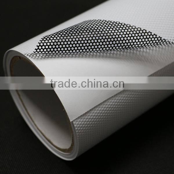 Premium removable glossy perforated film with clear acrylic pressure sensitive adhesive