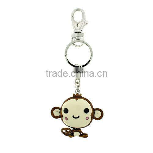 Brown cross keyring accented by spur fashion cross keychain