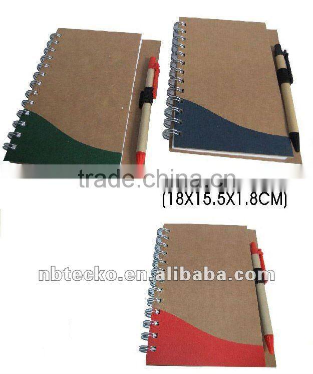 Recycled spiral paper notepad with recycled pen