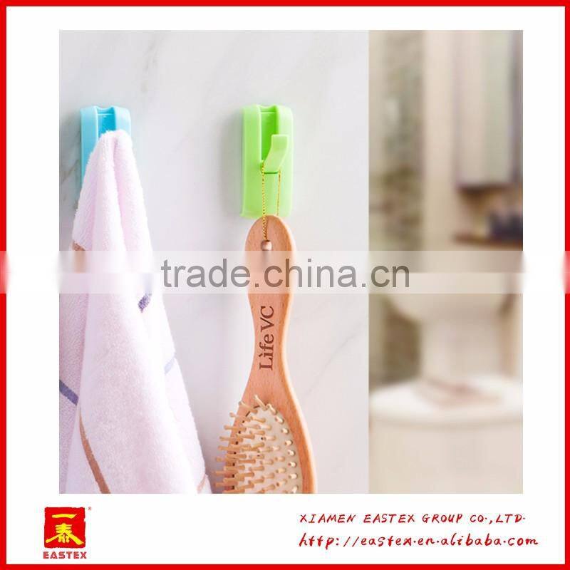 Plastic hook with adhensive tape