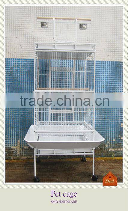 White wrought iron parrot cage