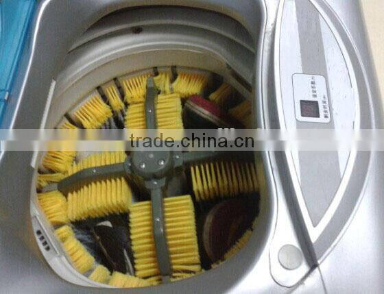 Coin feeding shoe washing machine