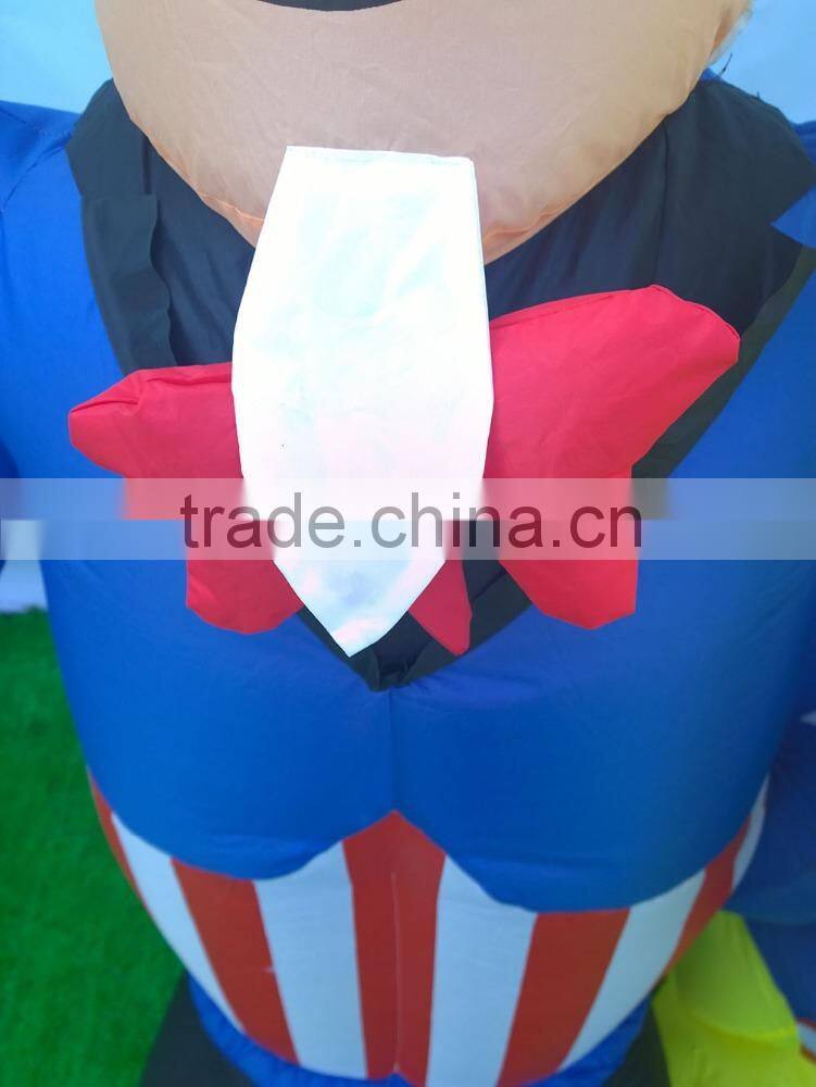 PATRIOTIC INFLATABLE 6' UNCLE SAM HOLDING AMERICAN FLAG WITH BALD EAGLE