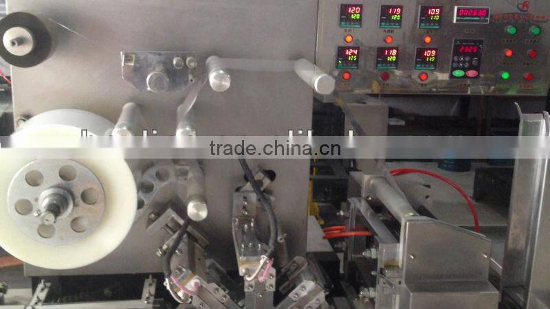 Automatic cellophane overwrapping machine