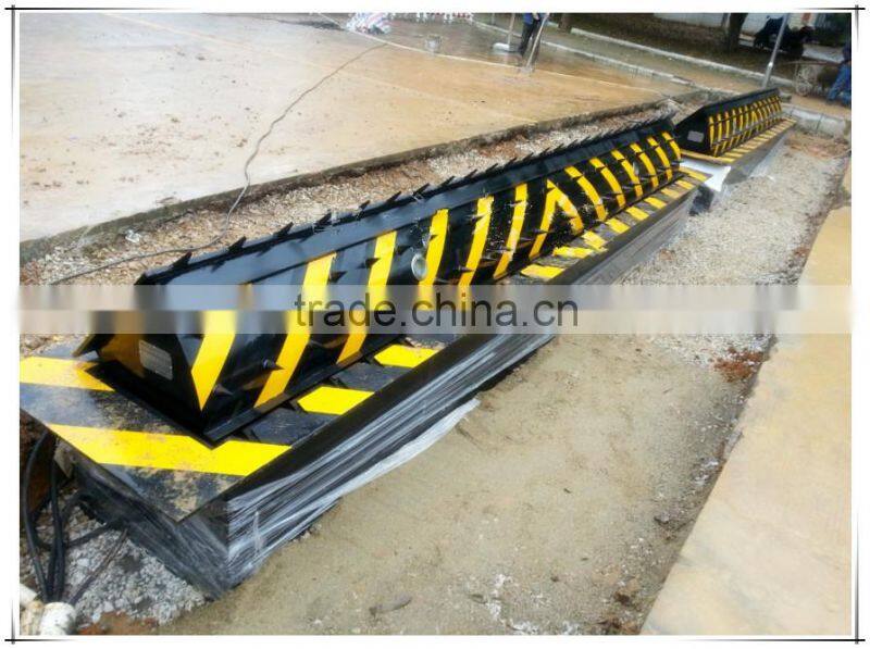 Hydraulic automated road barrier
