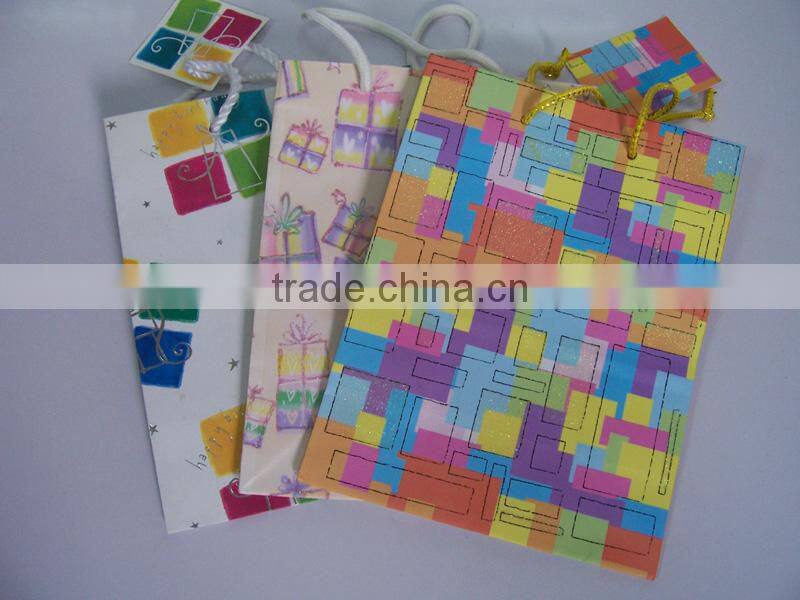2013 wholesale beautiful and eco-friendly coated paper gift/candy bag --size22*10*24cm