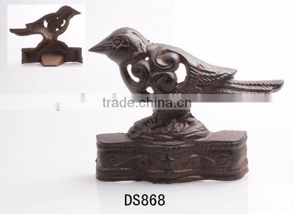 The cast iron mouse door stop