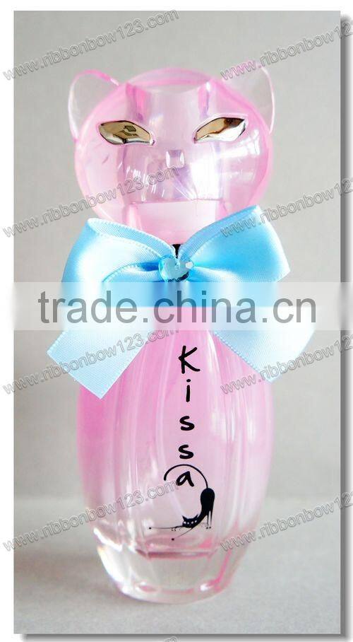 designs of ribbon flowers for perfume bottle