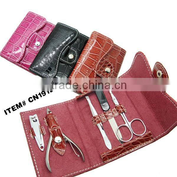 Red PVC pouch carbon steel manicure set in a purse