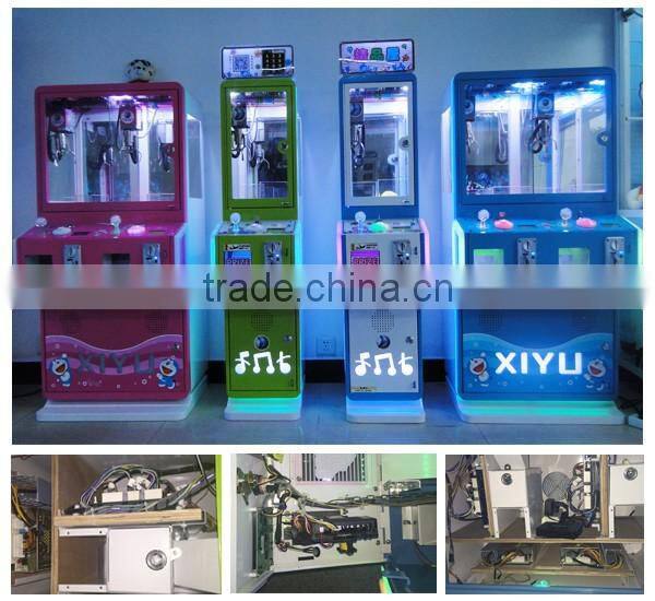 coin operated claw crane machine Claw Crane coin operated game machine cartoon claw crane vending machine 2015 new arriv