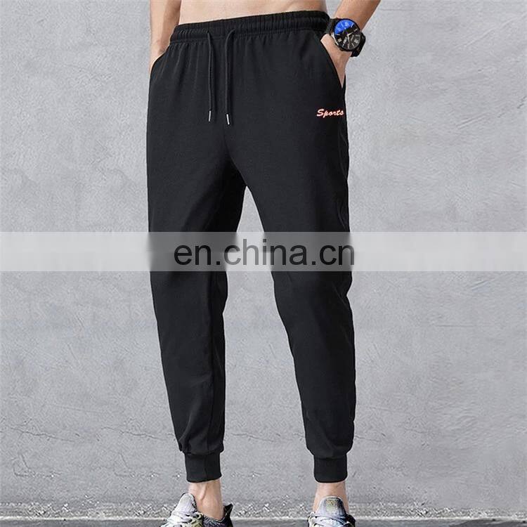 Wholesale custom brand logo men's new polyester cotton loose casual sports jogging pants