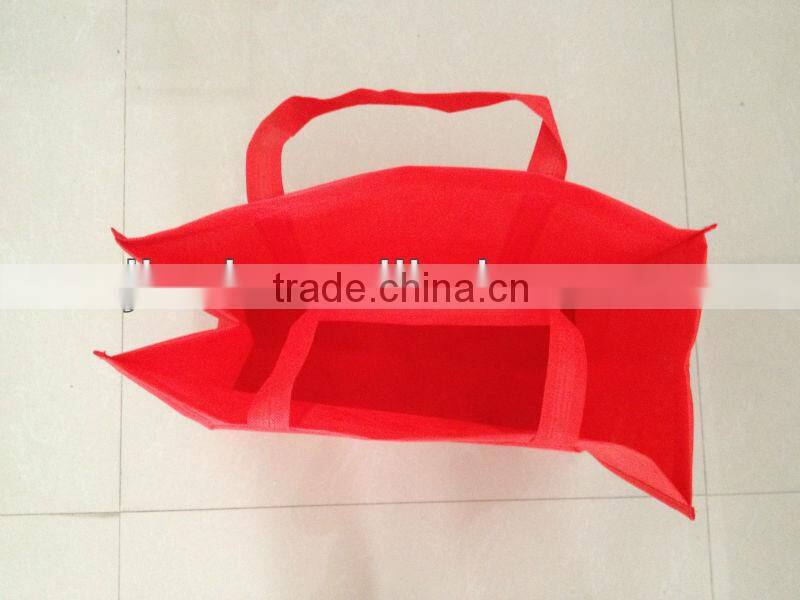 Ultrasonically welded non-woven hand bags