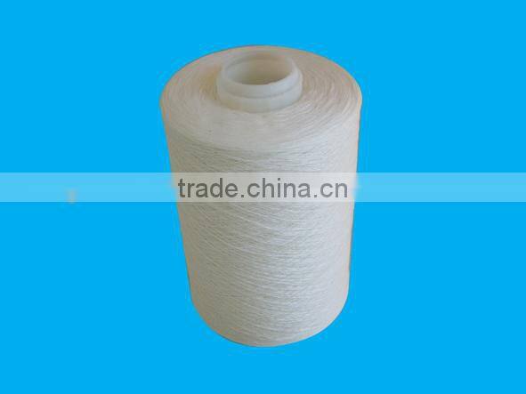Core spun poly-poly for sewing thread raw white