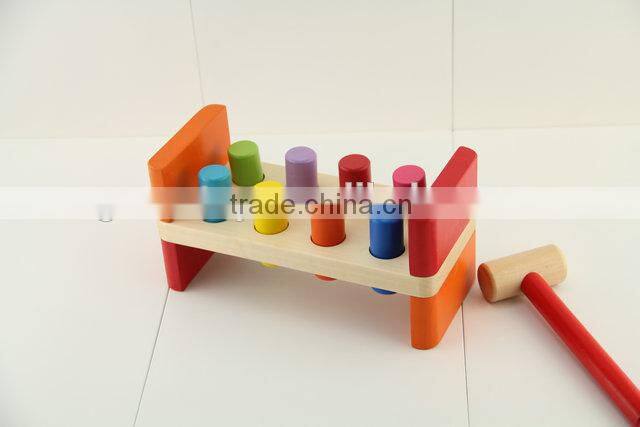 Wooden workbench toy with wooden hammer