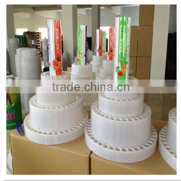 Popular plastic heavy gauge candy promotion display stand