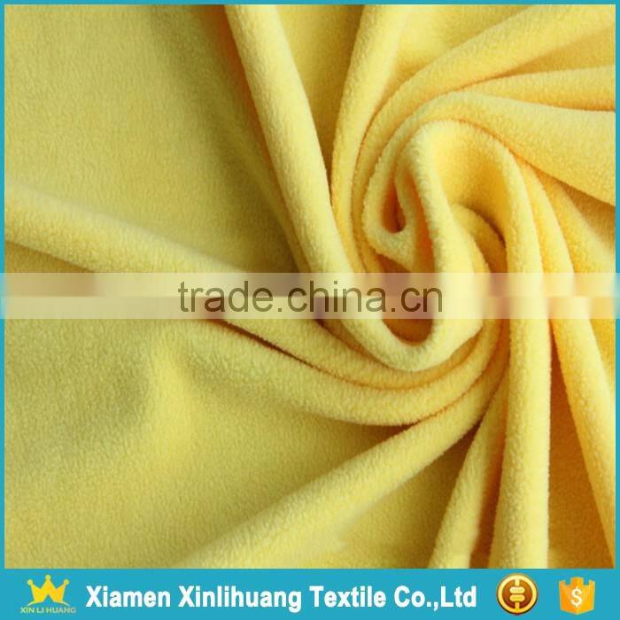 China Manufacture Knitted Yellow Polar Fleece Fabric for Jacket