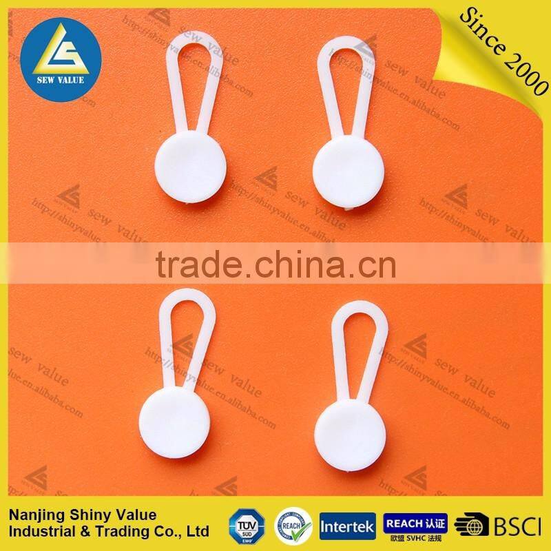 Plastic material shirt button extenders for easy fitting of your dress