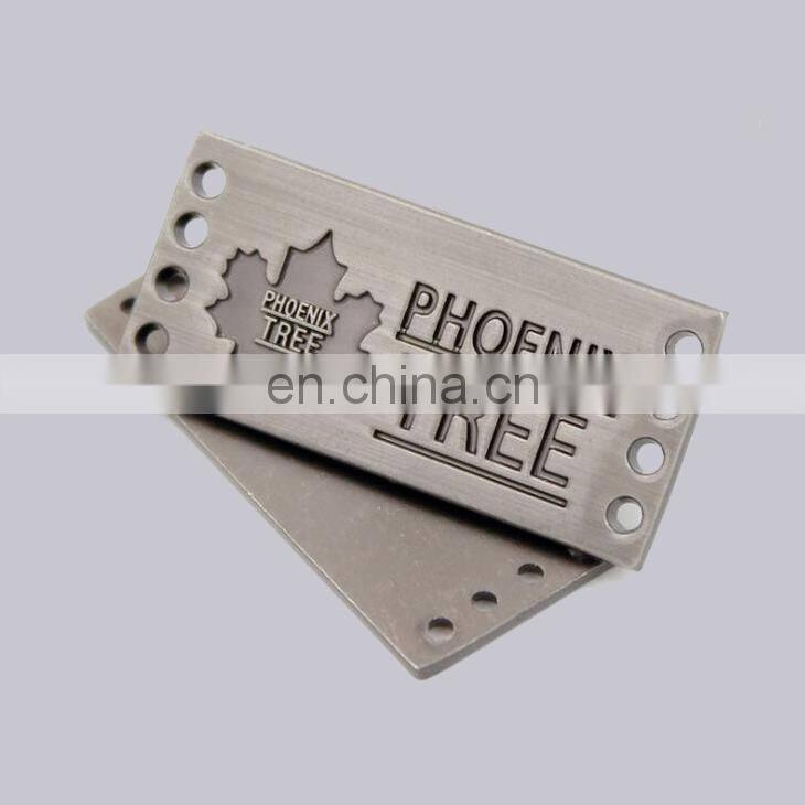 Professional Garment Decoration Use Custom Nikcel Plated Engraved Logo Type Jeans Metal Label With Holes