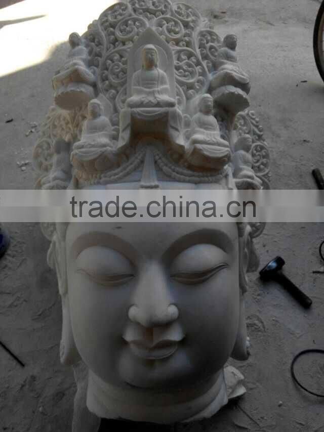 white marble stone buddha head
