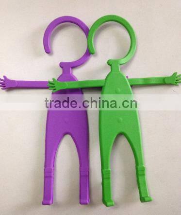 Phone Partner = flexible cell phone holder human hanger design
