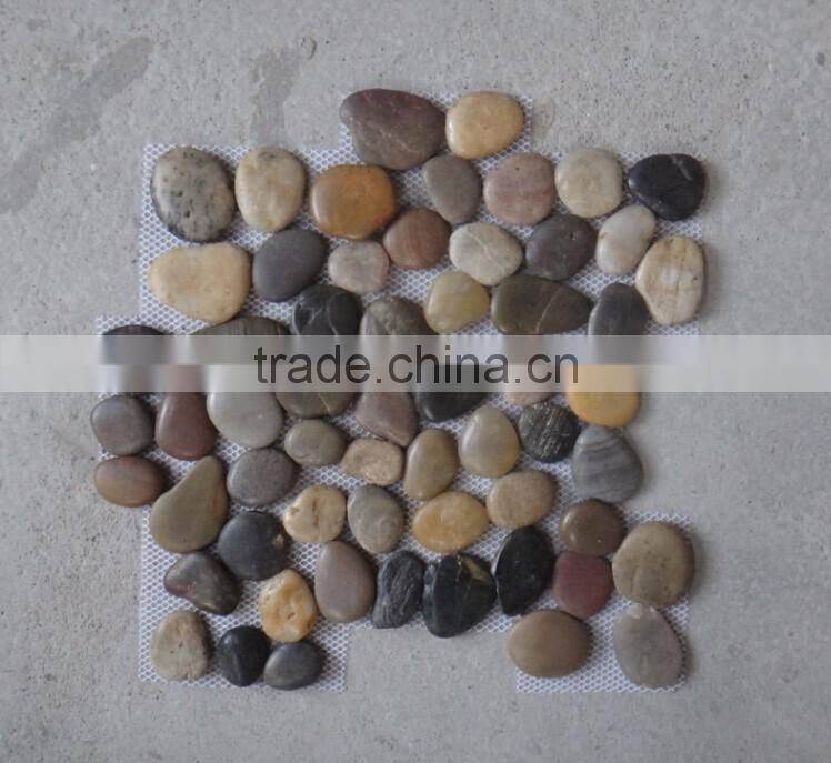 mixed colour pebbles/pebble meshed tile/cobble