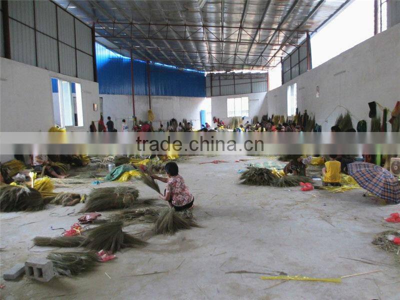 grass broom with short wooden handle