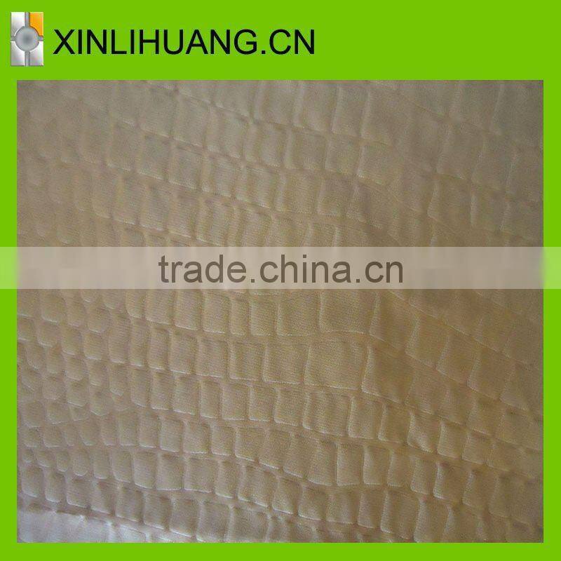 Embossed polyester fabric