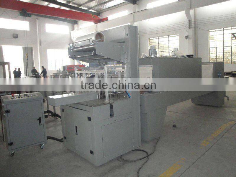 Automatic shrink packaging machine