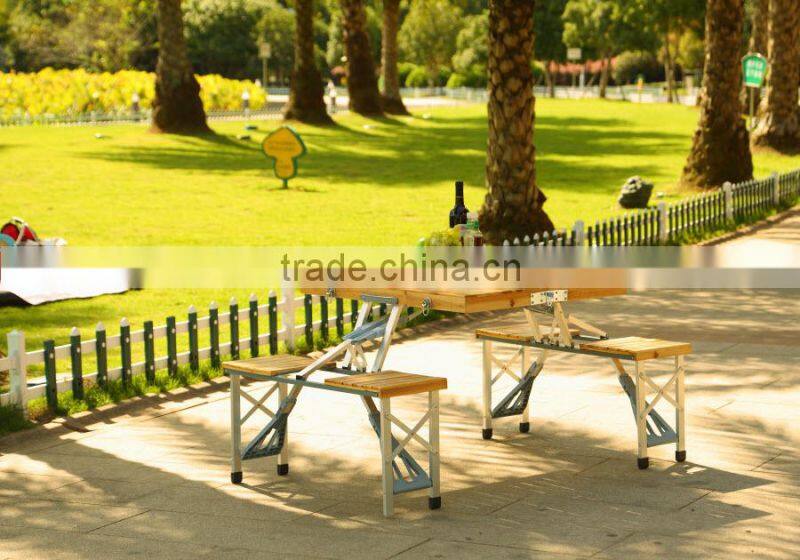 Wooden folding picnic table and chairs
