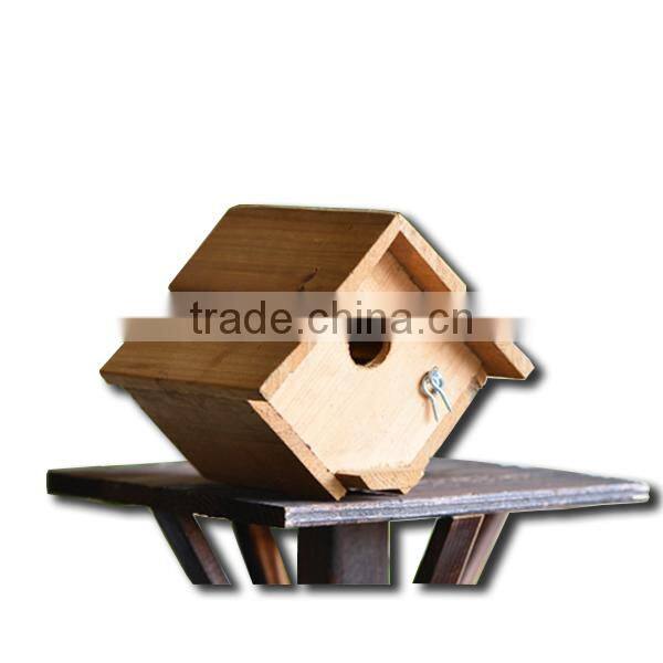 Rustic freestanding wooden bird cage outdoor