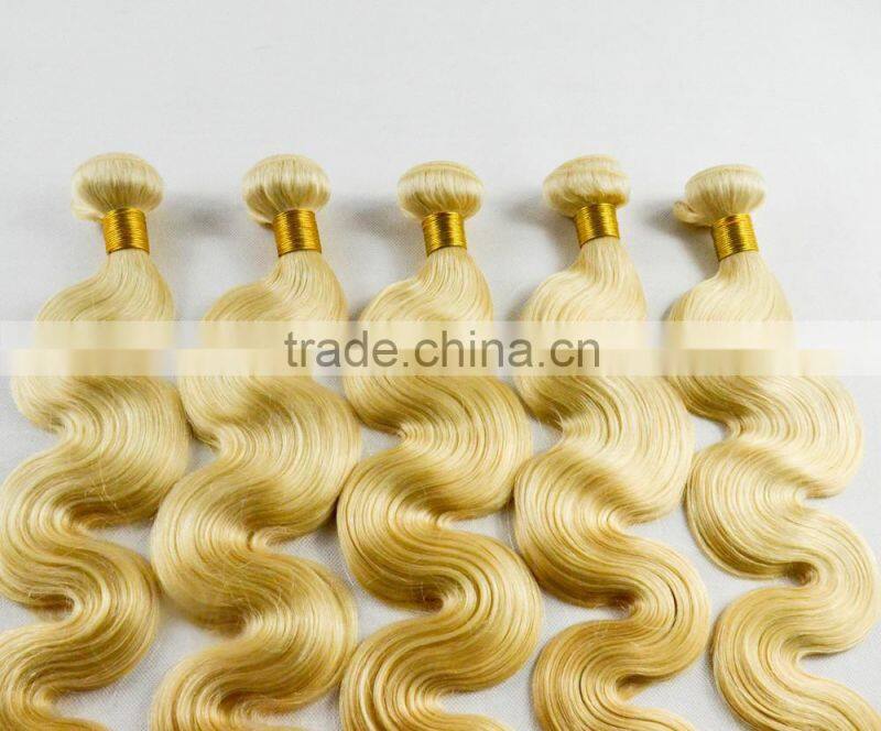 Peruvian body wave honey blond curly weave hair sew in human hair extensions