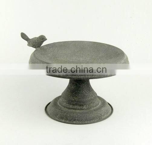 Small round antique gray metal bird feeder
