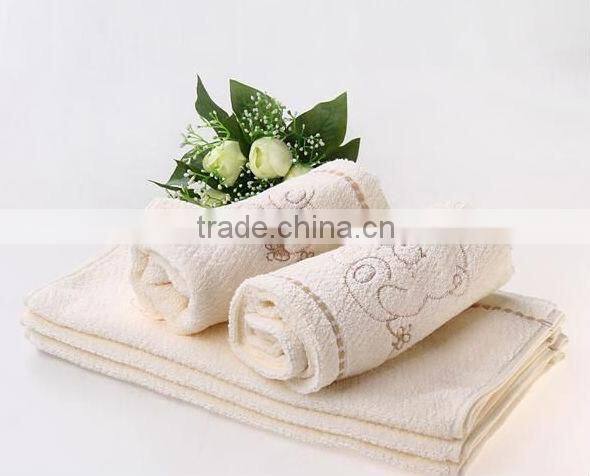 cotton white dobby bath towel with embroidery
