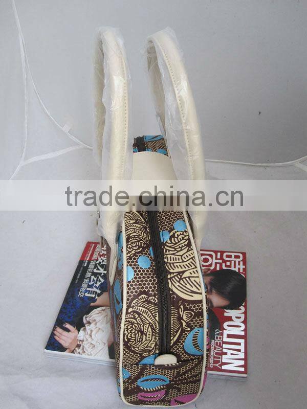 African printed wax fabric and leather bag
