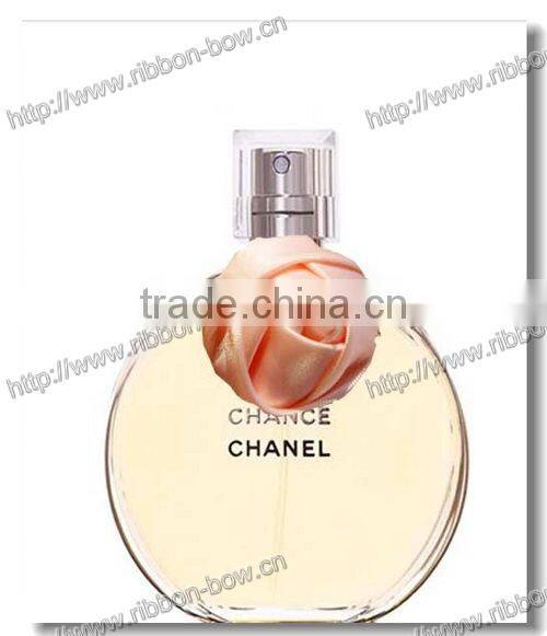 designs of ribbon flowers for perfume bottle