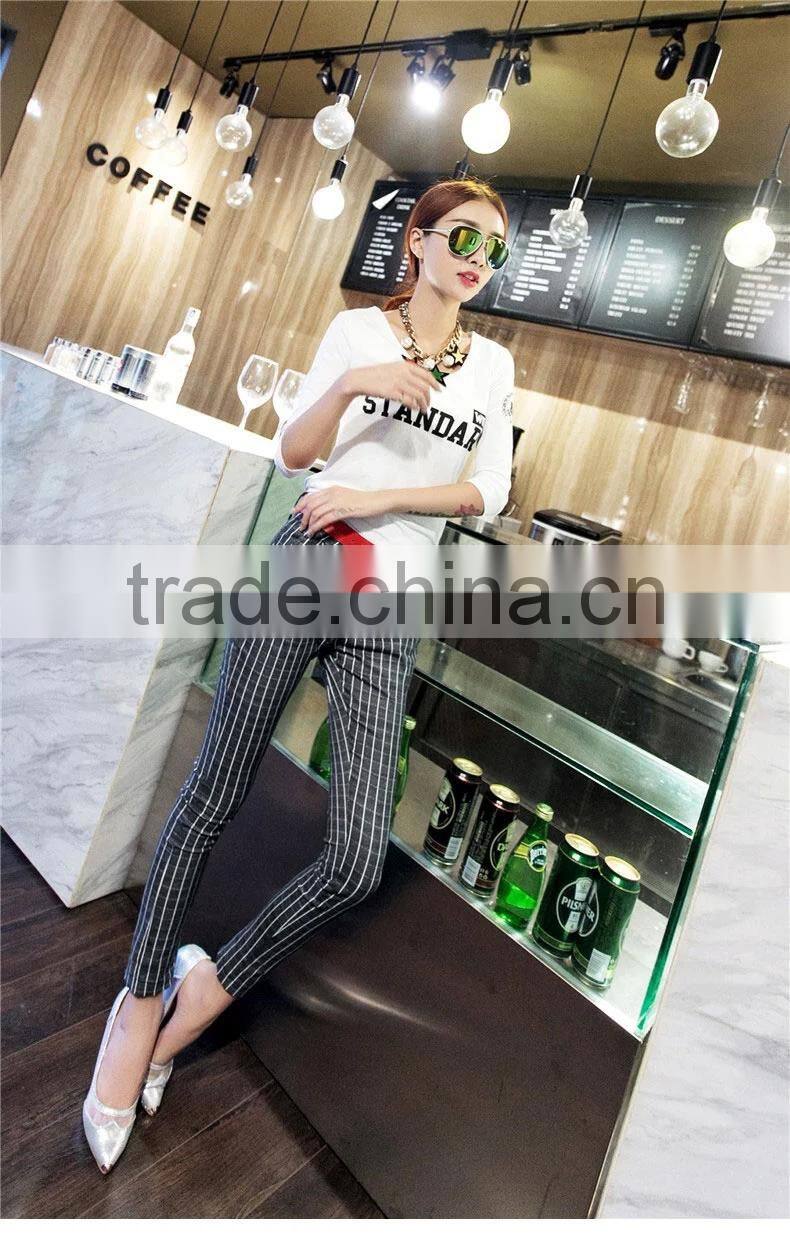 slimming black and white vertical striped pants
