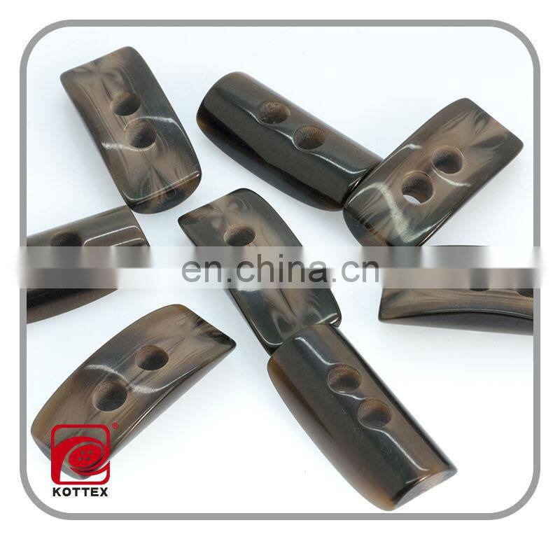 special shaped smooth surface resin imitation horn toggle buttons,2014 plastic toggle button,garment accessories