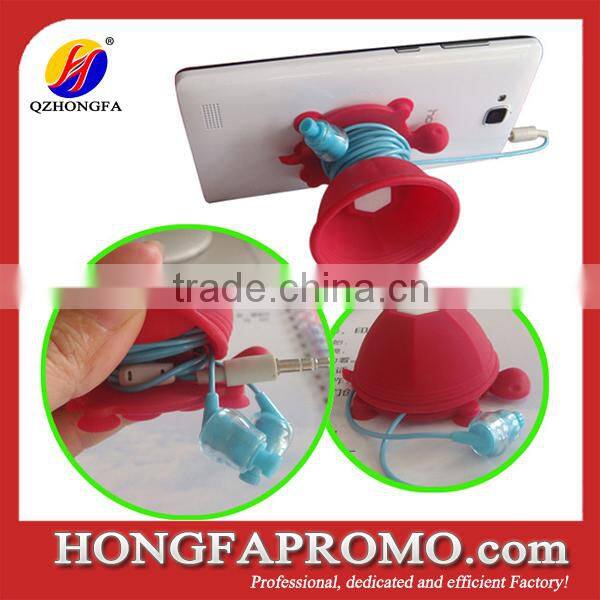 Silicone mobile phone holder with earphone wrap