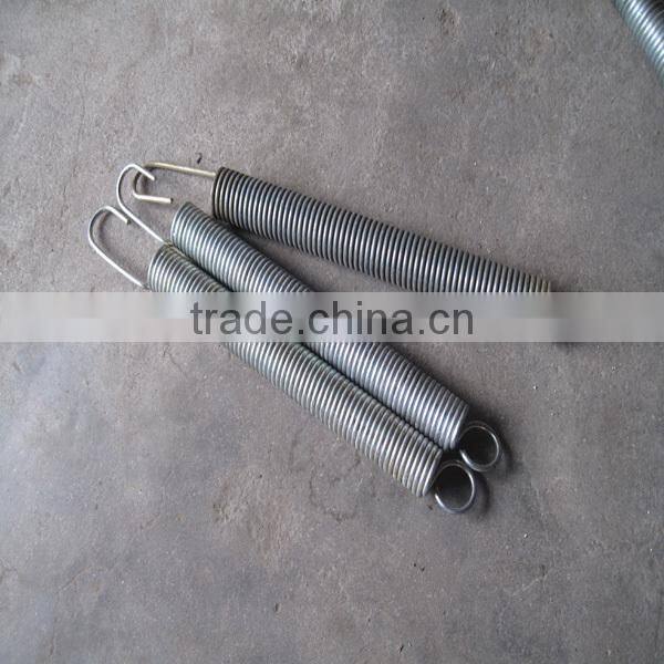 Farm tractor engine governor extension spring