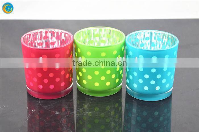 orange dotted glass candle holder