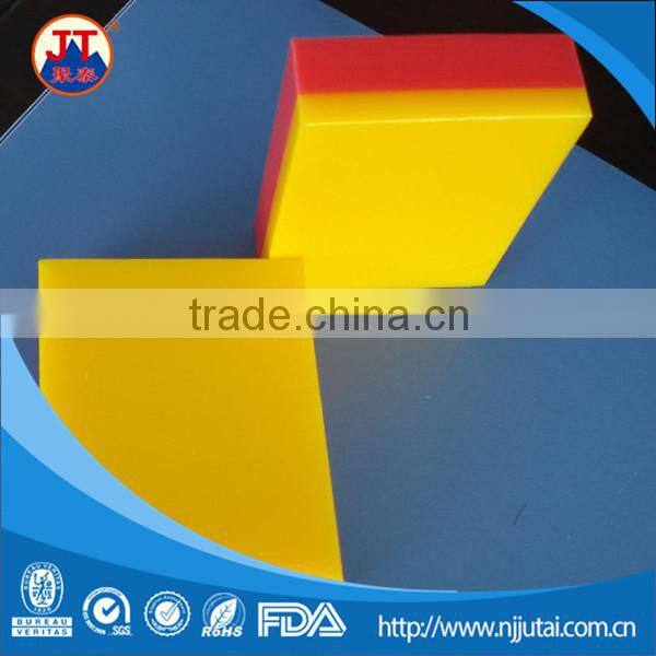 Wear resistant yellow with red bicolor UHMWPE sheet