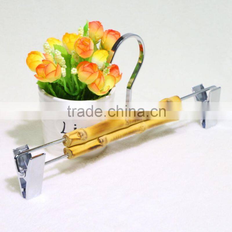 New fashionable bamboo hanger with metal rack