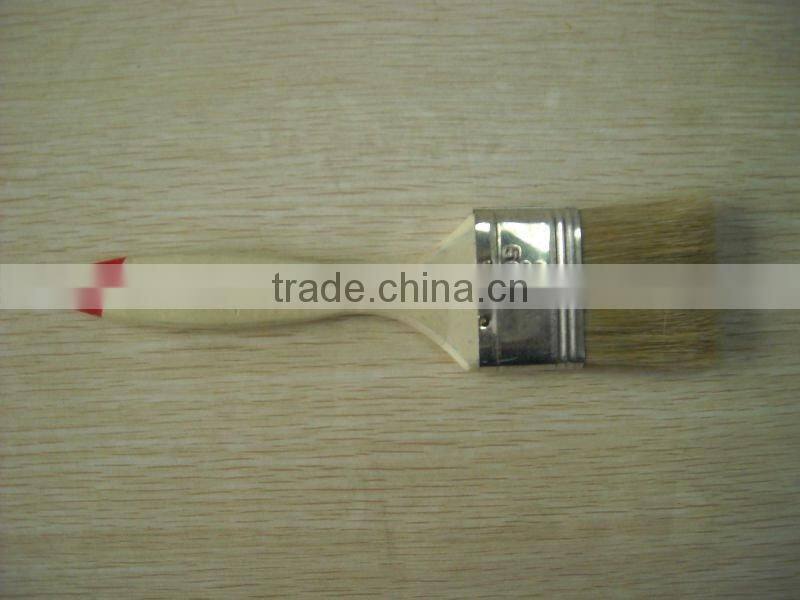 white and red end wooden handle paint brush