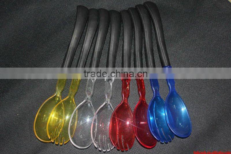 Colorful plastic salad spoon and fork set