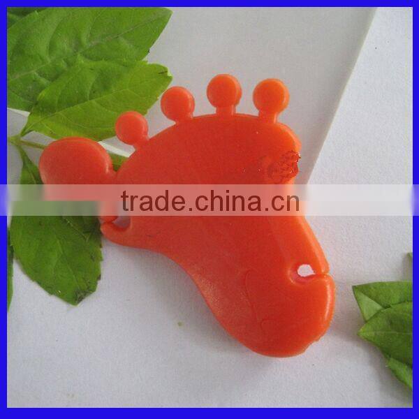 Hong kong foot shape silicone earphone cable winder for wholesales